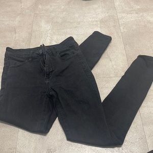 plain black american eagle skinny jeans